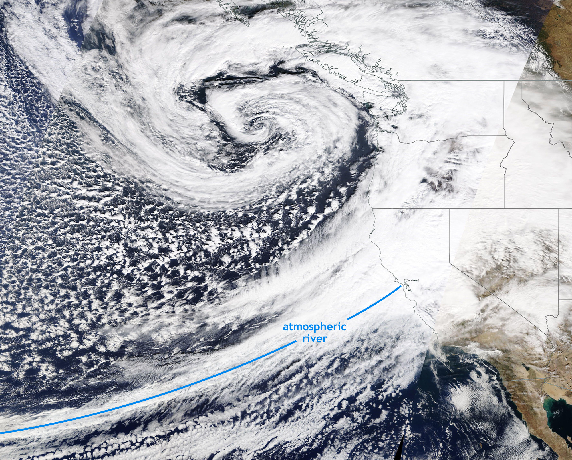 Natural-color satellite image of a cloud plume reaching form tropics to US West Coast