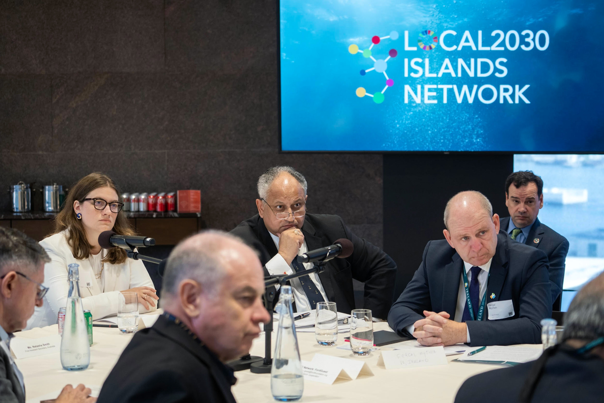 Kapnick and colleagues around conference table