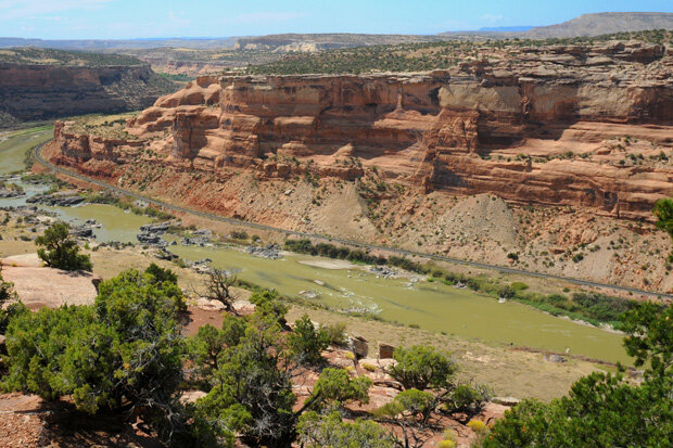 Red-rock canyon with green bottom