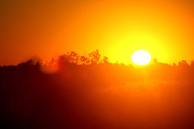Low-angled sun over hot landscape