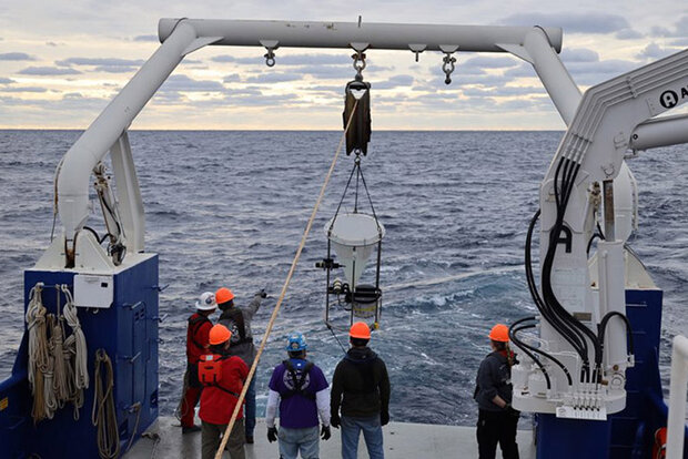 Crew members on ship deck