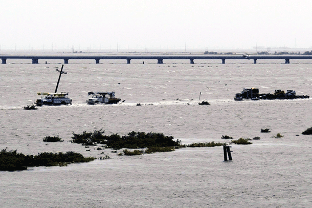 High ocean water levels under a low highway